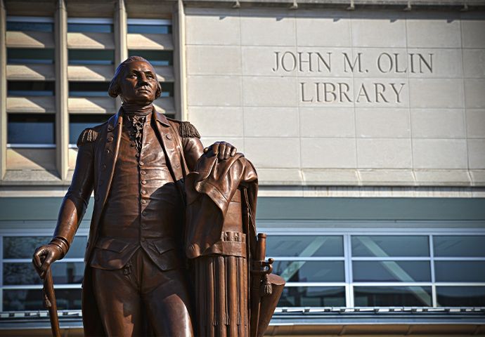 John M. Olin Library and Statue